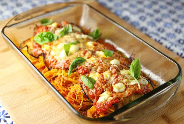 Baked rolled eggplant stuffed with spaghetti