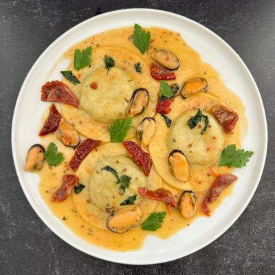 Broccoli Rabe and Bean Ravioli with Mussels & Sun-Dried Tomatoes