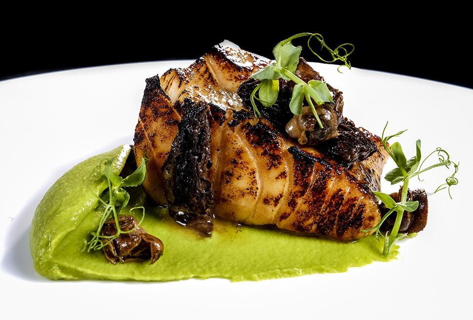 Jerusalem artichoke gnocchi with clams sauce and pumpkin seed powder