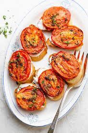 Tomatoes baked with oregano, citrus peel and pine nuts
