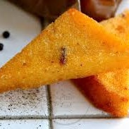 Triangles of polenta with cheese and pepper