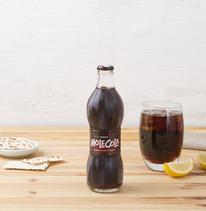 https://shop.sognotoscano.com/cdn/shop/products/italian-sugar-free-cola-molecola-in-glass-bottle-11oz-drink-sogno-toscano-170287_683x700.jpg?v=1616858893